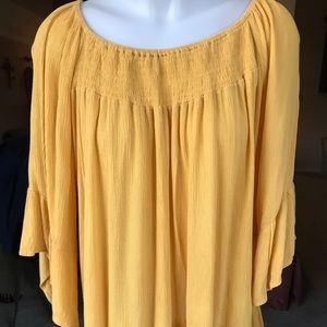 Yellow flowing shirt